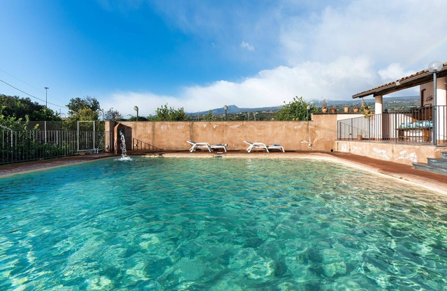 Charming villa with pool, blossoming garden & view