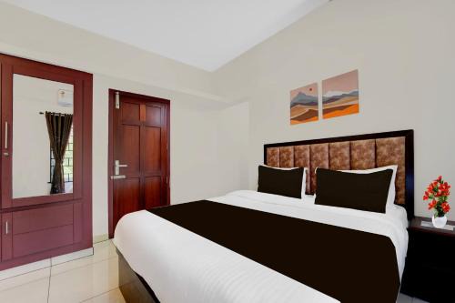 Collection O Valiyavila Junction Formerly Prism Heights