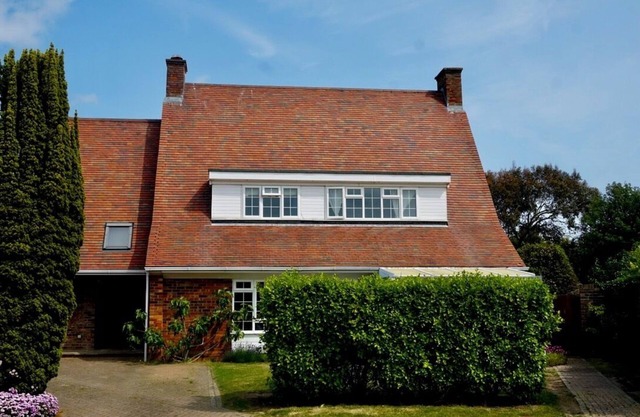 Colourful Coastal Retreat. Six bedroom family home next to West Wittering beach.