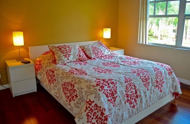 Come cozy up in this West Boca Raton apartment overlooking the pool
