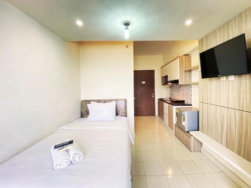 Comfy Studio Apartment at Harvard Jatinangor By Travelio
