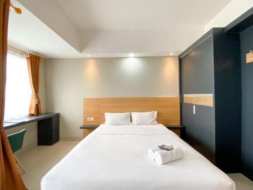 Comfy Studio at Gateway Park LRT City Jatibening Apartment By Travelio