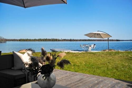 Cottage With Beach Plot, Boat And Jetty In Småland