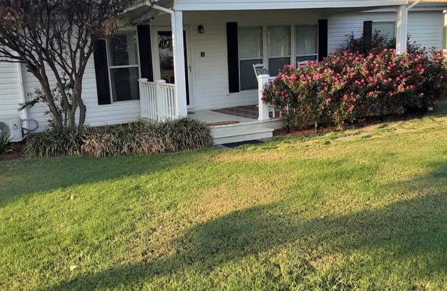 Country Living on Acreage with Pond