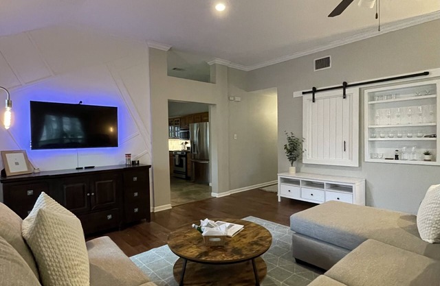 Cozy and cheerful three bedroom home with hot tub.