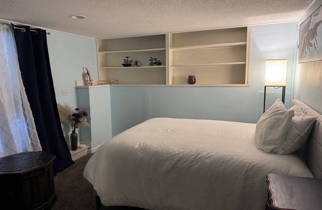 Cozy basement apartment with private bathroom, kitchen and entrance.
