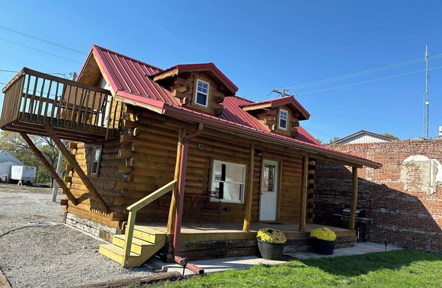 Cozy log cabin located in downtown Moravia, Iowa.