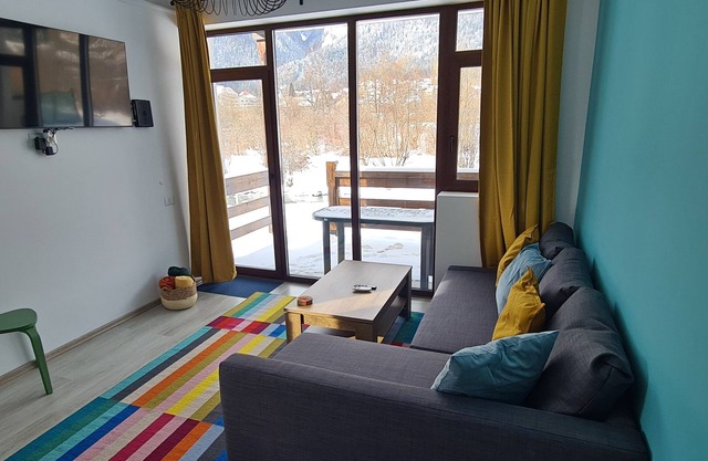 Cozy Riverfront Apartment 1 with mountain view