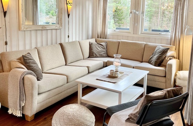 Cozy vacation home in southern Norway (Tromøy, Arendal) with a boat and a pier.