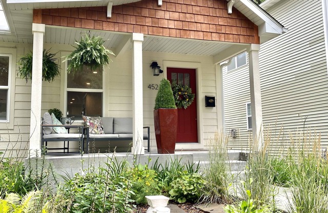 Creek half a block away! Family-sized, specious home with back patio and garden