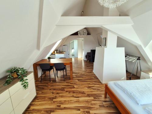 Dachgeschosswohnung 1 - Apartments am Schloss