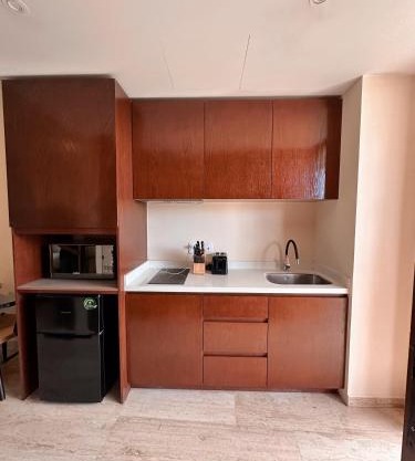 Departamento con balcon y albercas con vistas impresionantes