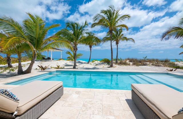 Directly on the beach with newly installed generator and heated pool!