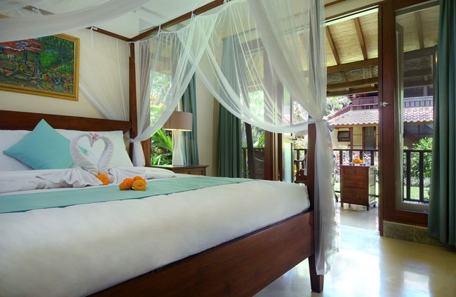 Double Bedroom with balcony, Exotic blend Javanese & Balinese style villa