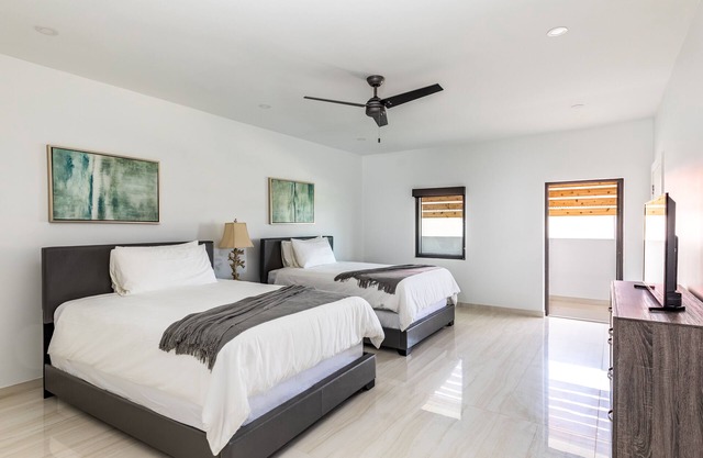 Double Queen Bed Suite — Steps to Grace Bay, Pool, Bikes, Free WiFi