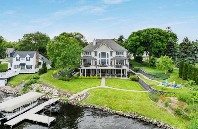 Downtown Lakefront Home on Lake Chetek w/hot tub & pontoon & jet ski rental
