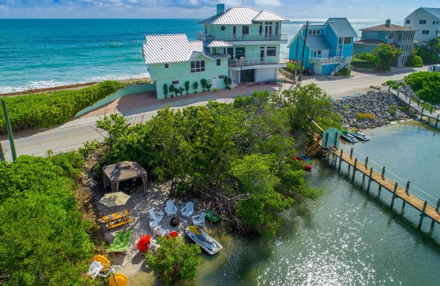 Eden Beach! Ocean-to-River Fla Beach House. ON THE BEACH! Dock, hot tub, & more