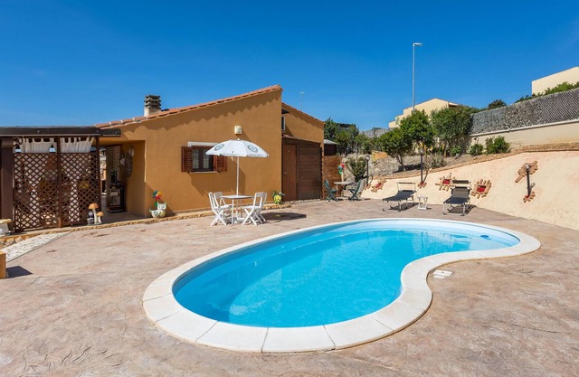 Enjoy a beautiful sea view from the terrace of this pet-friendly vacation home.
