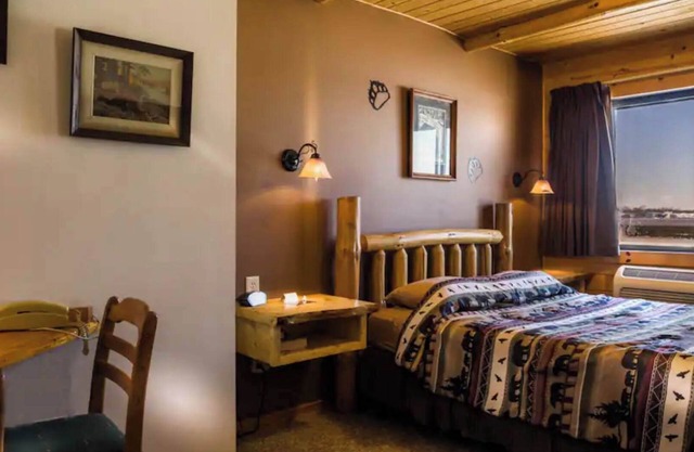 Enjoy a lakeview sunset in Room 6 No Pet-The Bear's Den- Curriers Lakeview Lodge