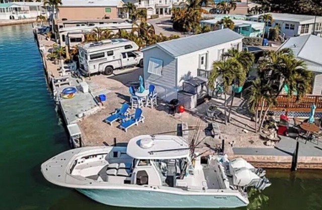 Escape to an oceanfront Home with Boat Dock + pickleball, Pool and more!