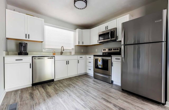 Escape to Sunset Cove, a serene lakeside retreat with modern comforts, stunning views