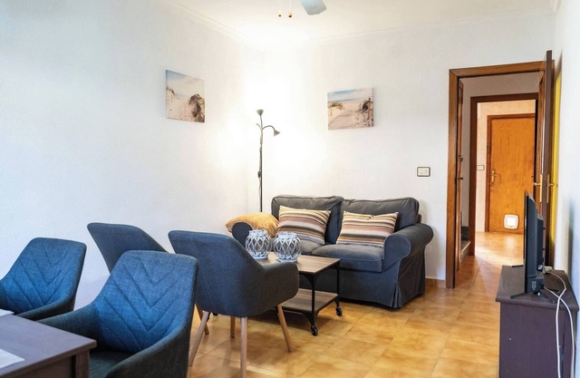 Family-Friendly Apartment with Patio – Steps from Playa Villanitos