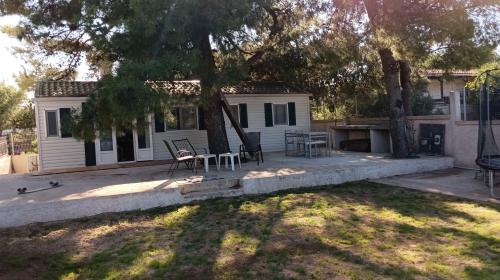Family mobile home solar powered near the sea and the airport