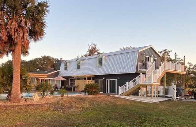 Family Reunion Estate for 23 with pool and incredible island views.