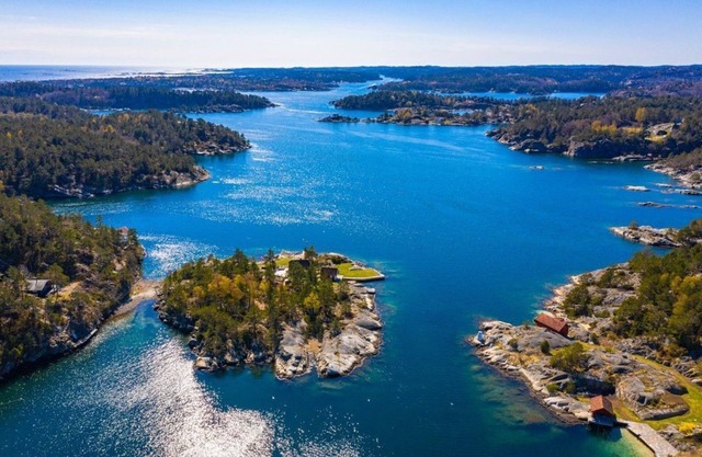 Flott Hus ved sjøen Brygge Båt Nært Kristiansand Aagerøya