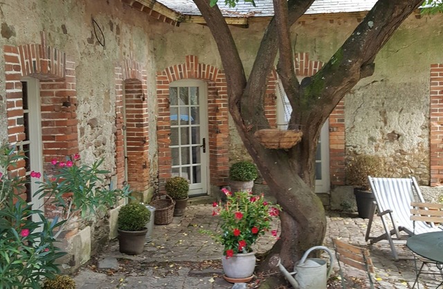 Gite with shaded paved terrace