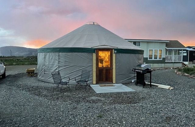 Glamp in style in our 27' yurt. Situated by our Tiny Home area.