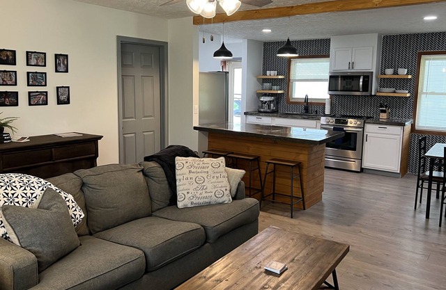 Graceful renovated home with pond near golf and town