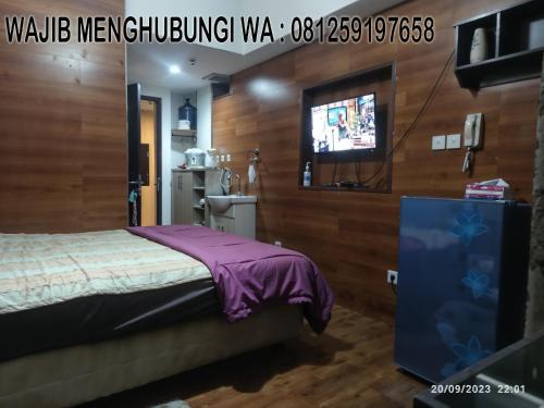 Grand Dhika Apartement by 2325 Studio room with cozy wooden style room