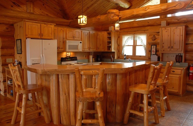 Handcrafted log lodge on Minnesota’s clearest lake. Nestled in the woods.