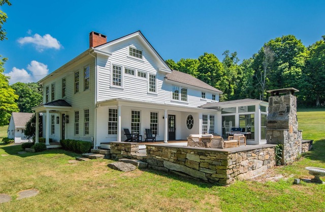 Historic 1750's farmhouse w/hot tub, outdoor fireplace and gym.