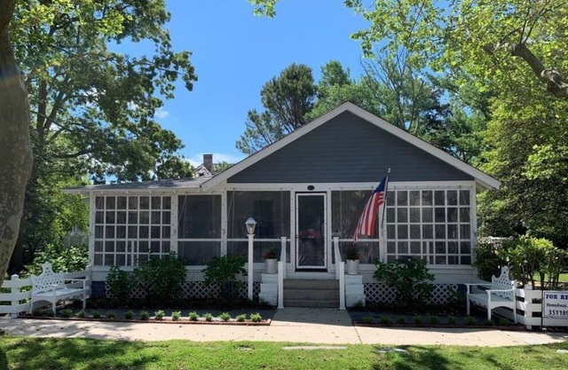 Historic Pines Cottage Sleeps 10 – Walk to Beach, Porch, Patio, and Charm!