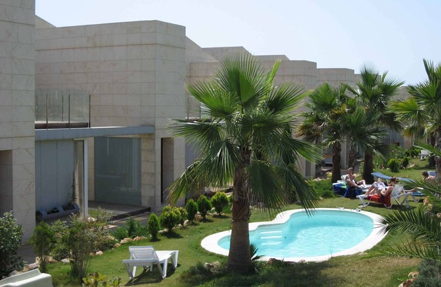 Holiday apartment with a beautiful garden and several small pools