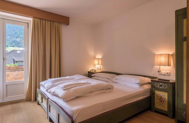 Holiday Home 'Dolomiti Rondula' with Mountain View, Shared Pool and Wi-Fi