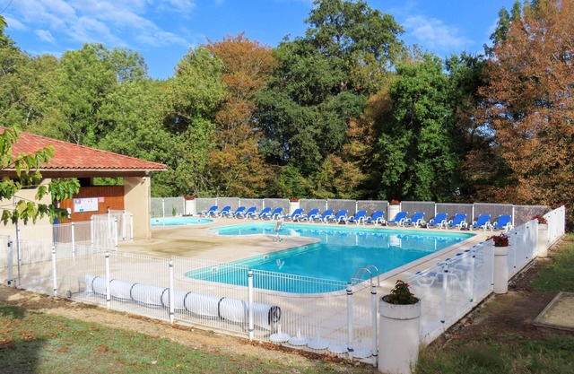Holiday home on small park with pool in the Lot