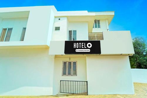 Hotel O Kureepuzha Kollam