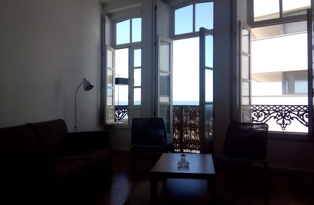 house in Porto with views of sea and river.