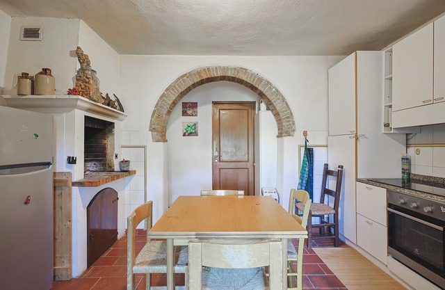 House in the woods with swimming pool.