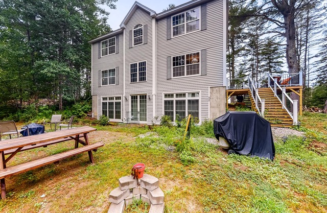 Idyllic waterfront home with furnished deck, grill, sweeping views & private W/D