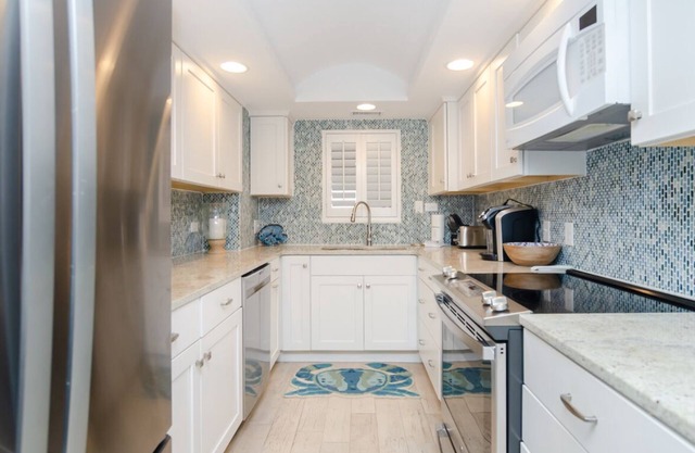 Immaculate ocean front condo in Station One!
