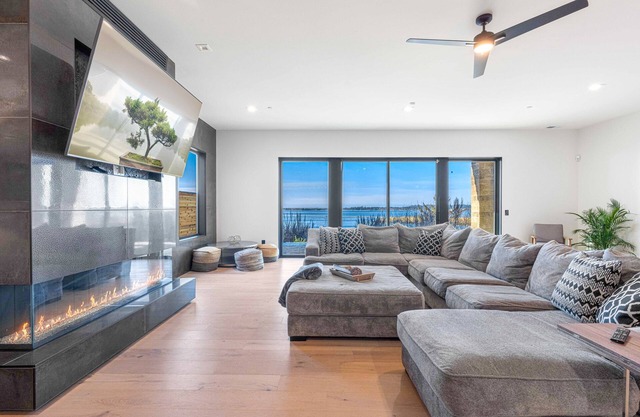 Impressive home w/water view, 2 large decks, 2 living rooms & 2 master ensuites