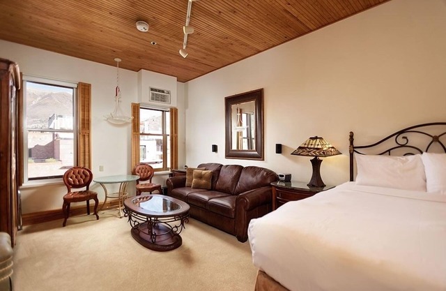 Independence Square Unit 306 | Hotel Room with Large Sitting Area & Wet Bar