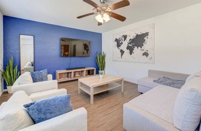 king bed with Pool table, decked patio and gym