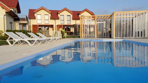 Koralia Domki i Apartamenty Basen z podgrzewaną wodą