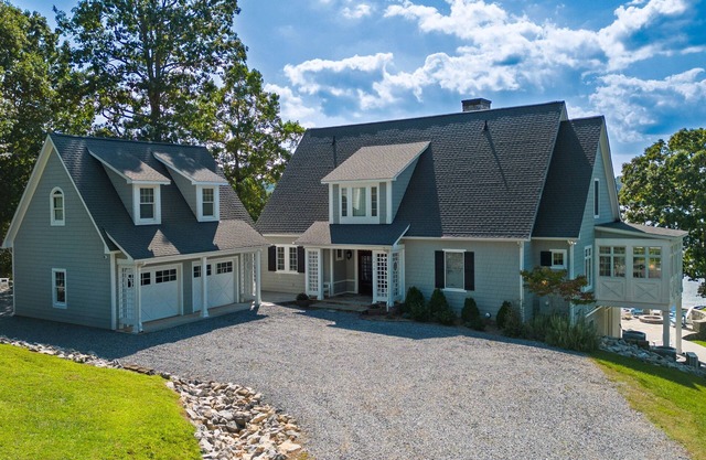 Lakefront home with amazing views, dock, firepit, foosball, patio, garage studio