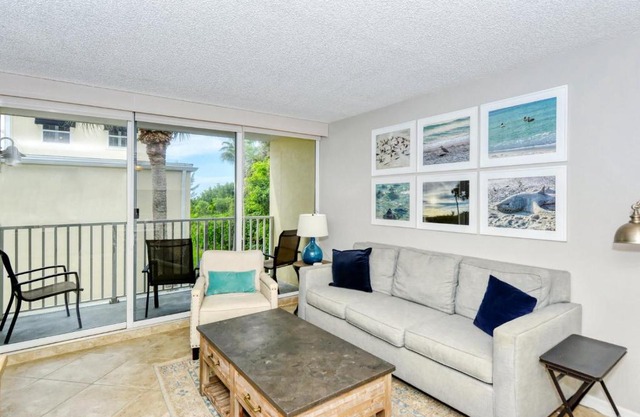 LaPlaya 202E Catch the gentle Gulf breezes on your private balcony beneath the swaying palms